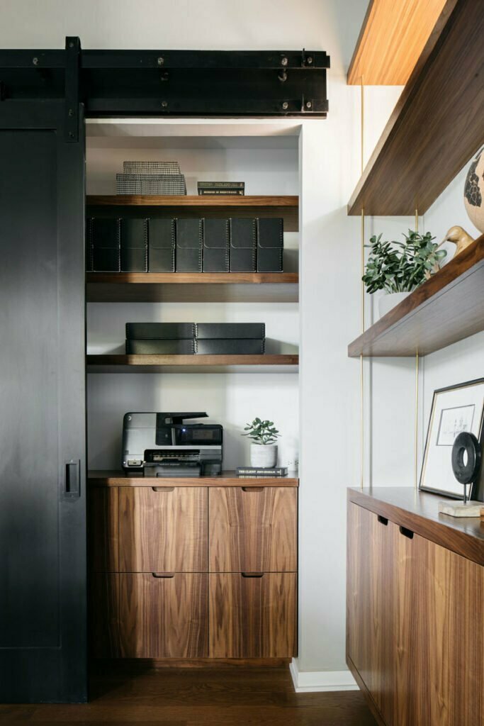 Walnut study with cabinets and sliding door