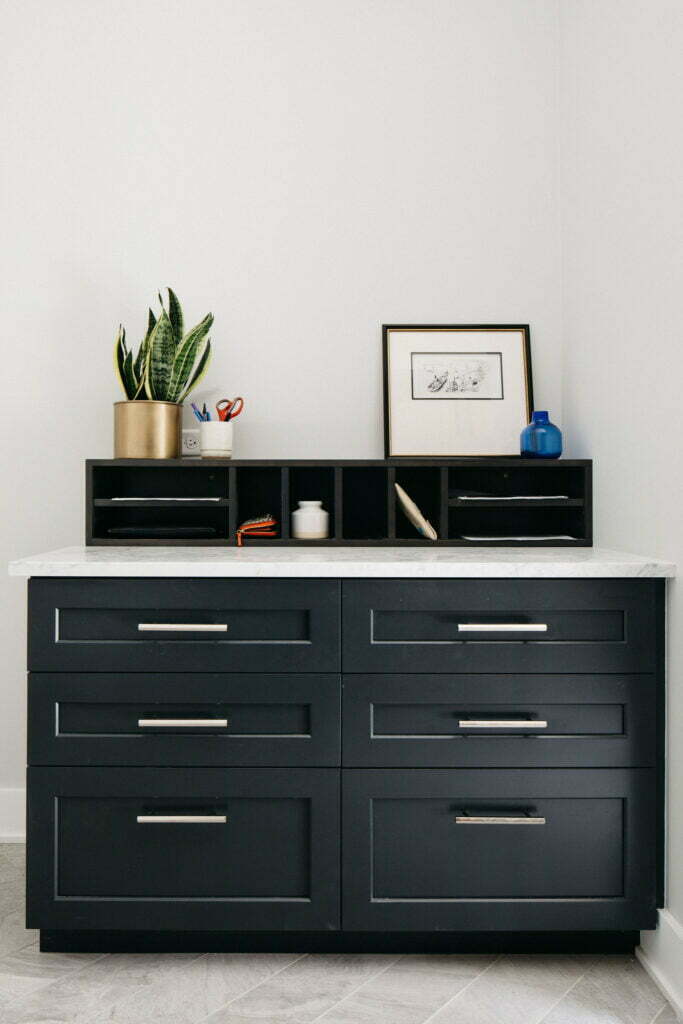 Maximizing space with Custom Cabinetry. Black custom cabinetry