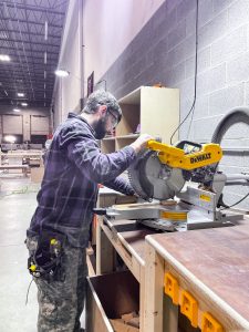 Trim Tech Designs builder working in the company woodshop in Naperville, IL.