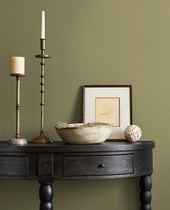 An example of how Edamame looks painted on a wall with a piece of furniture in front of the wall.